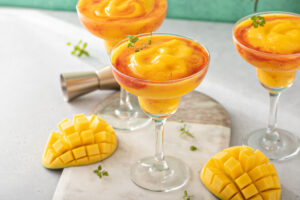 fresh mango strawberry swirled slushies